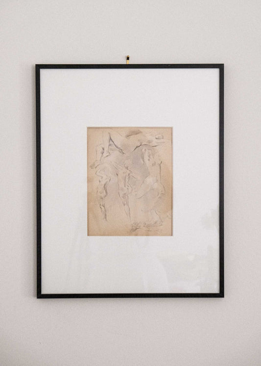 Framed artwork on a plain wall