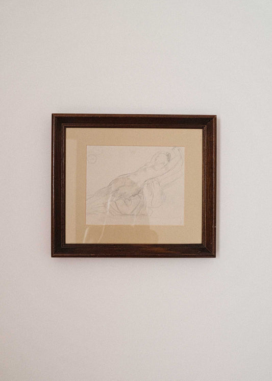 Framed artwork on a plain wall